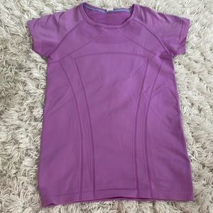 Barely worn I Ivivia tshirt, similar size to a woman’s 2